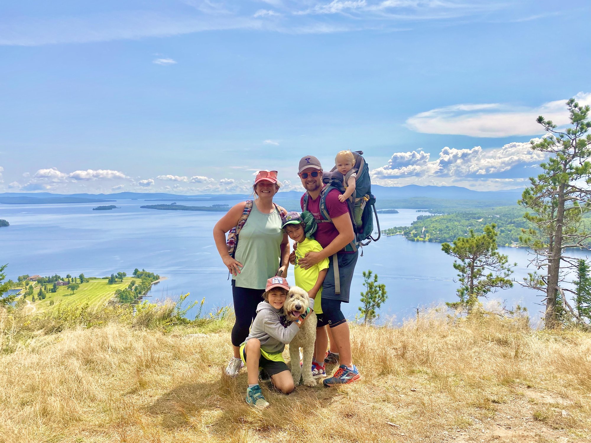 Dr. Daggett with his wife, three sons, and the family dog at the top of Mount Kineo, Moosehead Lake