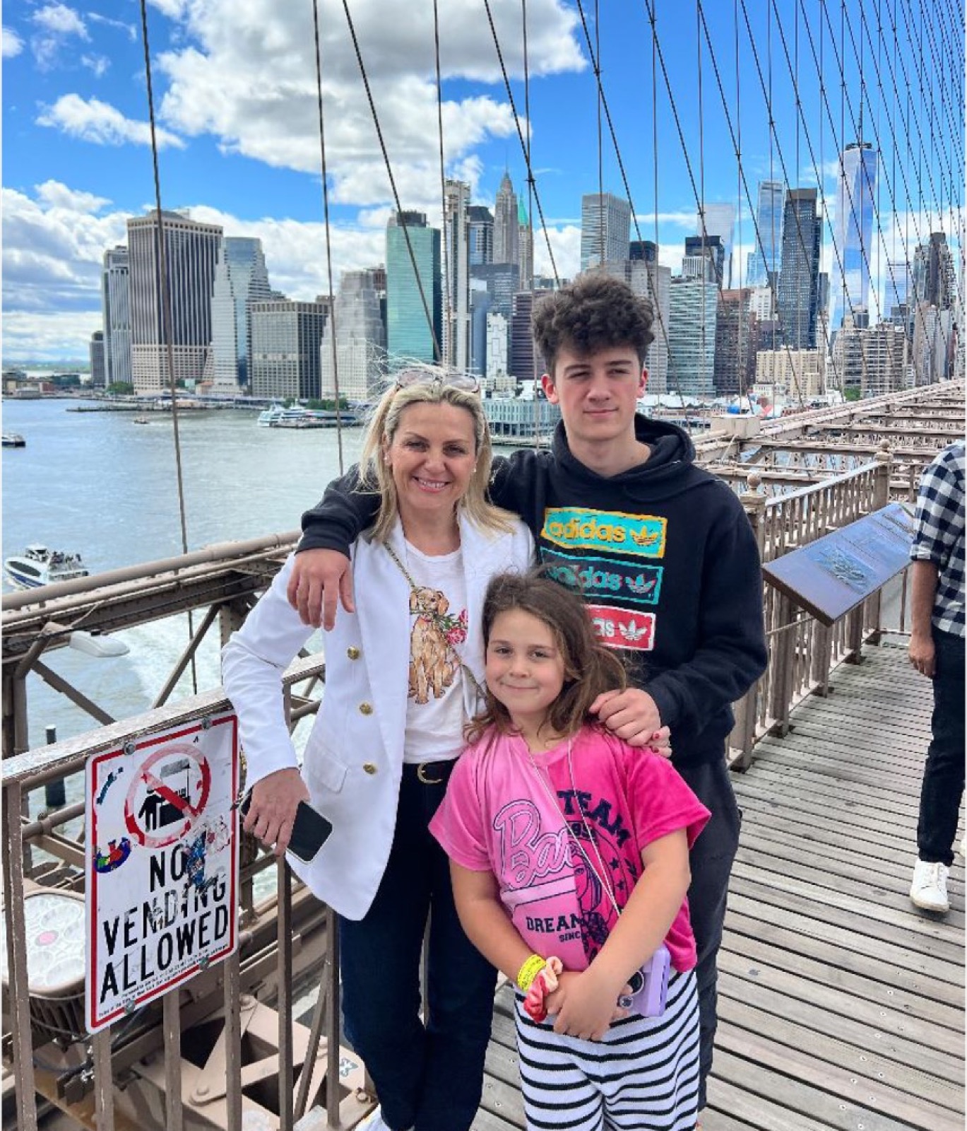 Krstic with Uros and Lara on the Brooklyn Bridge on her fiftieth birthday